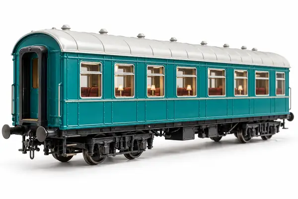 A teal miniature railway carriage with a pale roof and two roof vents, isolated on white.